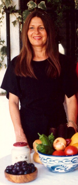 Claude in Spain at the time she was running a popular French restaurant.
