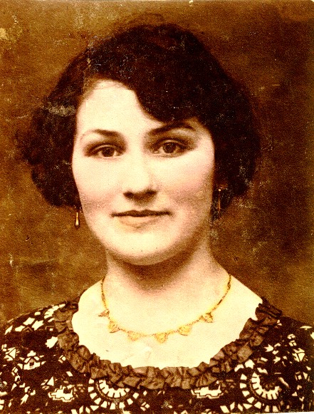 Sepia portrait of a young woman wearing a necklace