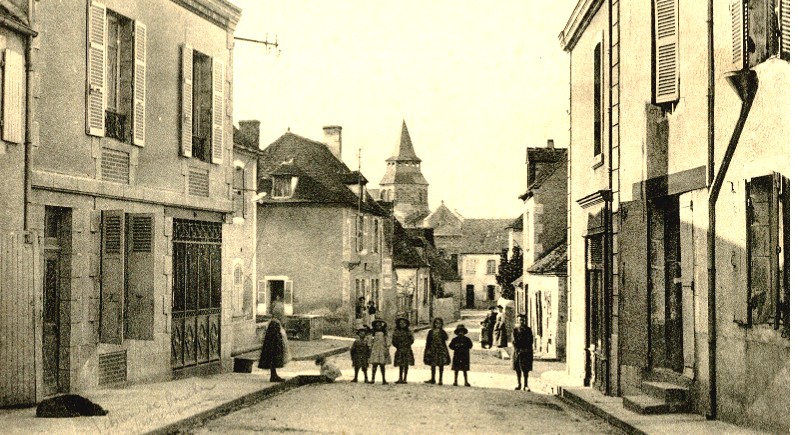 Old postcard of a village street in France