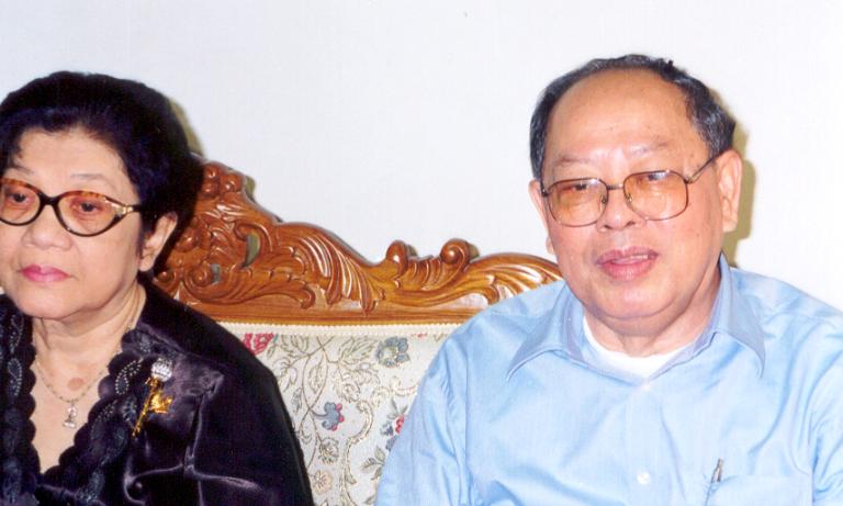 A woman and a man seated together