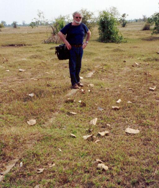 Zalin Grant standing on the foundation remains of the building where the captured journalists were held in Cambodia from 1970 to 1975. (Photo by Sos...