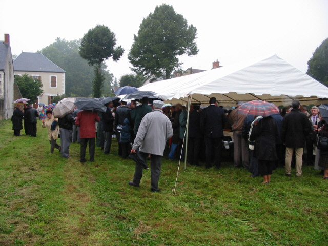 After the ceremonies, we huddled under the tent for a quick apéritif. And then rushed to the dry and warm Salle des Fêtes.