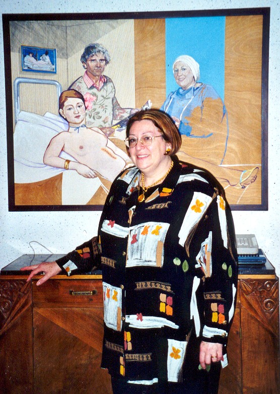 Odile Langlois at home. The painting shows Odile operating on Manet's Olympia with the help of Robert, a work created by their friend Herman...