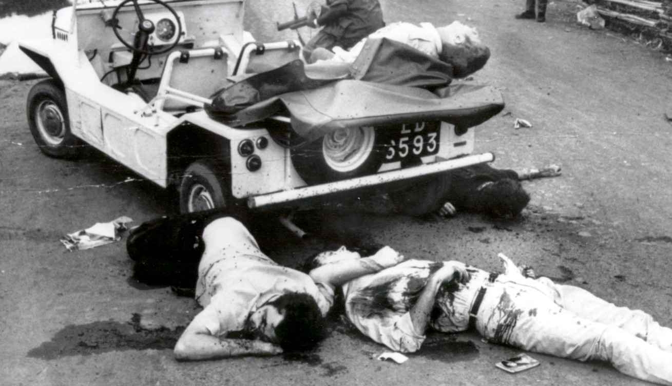 This is what we saw when we finally reached the newsmen. John Cantwell, bloated in the heat and covered with flies, had been shot 17 times. The guy...