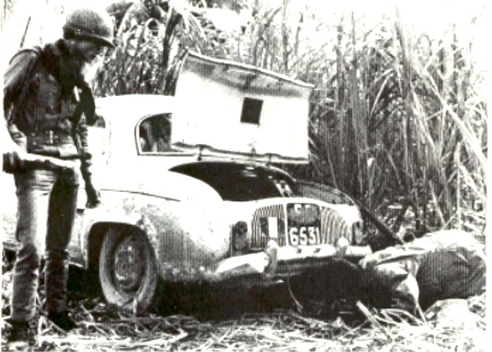 I'm looking under Michèle's car at the most frightening boobytrap I'd ever seen. I should have crawled over on my knees and thanked that Vietnamese...