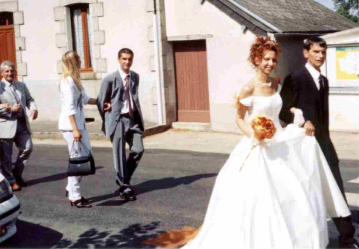 The bride and her father lead the procession to the mayor's office.