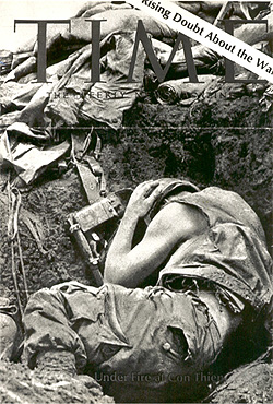 Dana Stone’s photo of Marine under rocket fire used as a Time cover—1966.