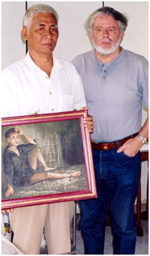 With Vann Nath, holding his self-portrait, the only one of his genocide paintings he chose to keep. Phnom Penh—2001.
